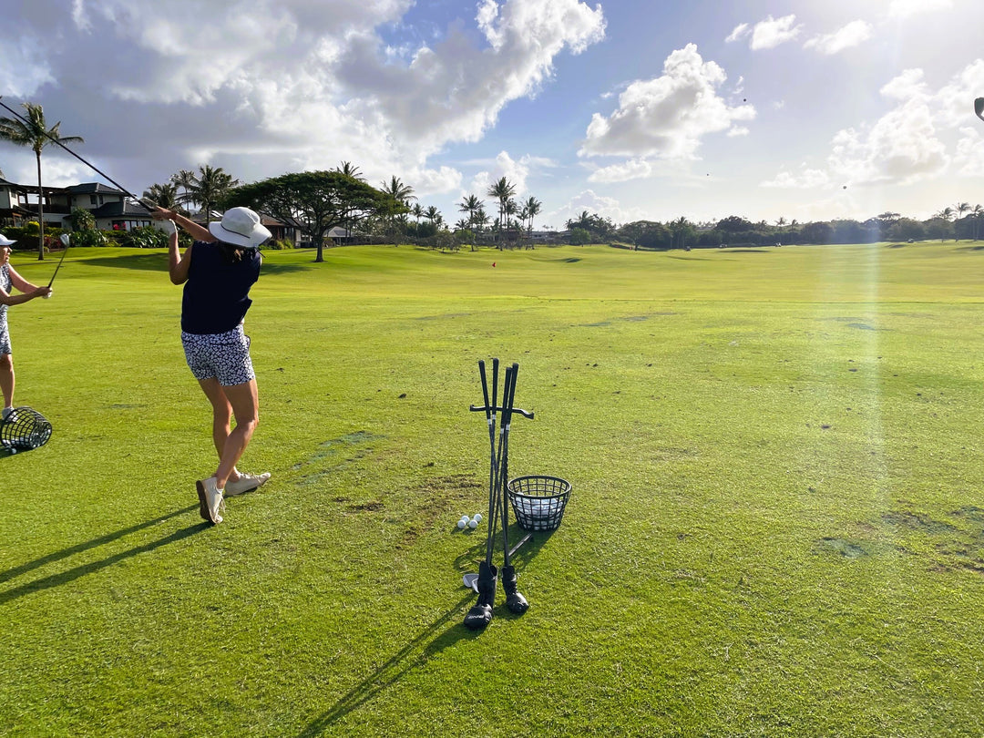 woman in a KINONA on the course