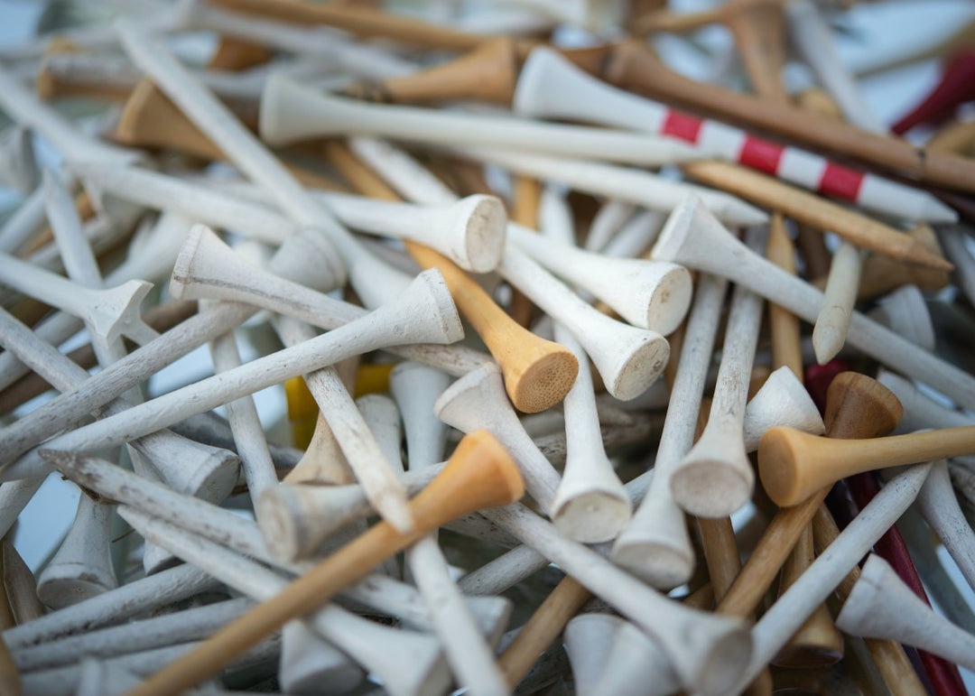 Golf tees in a pile