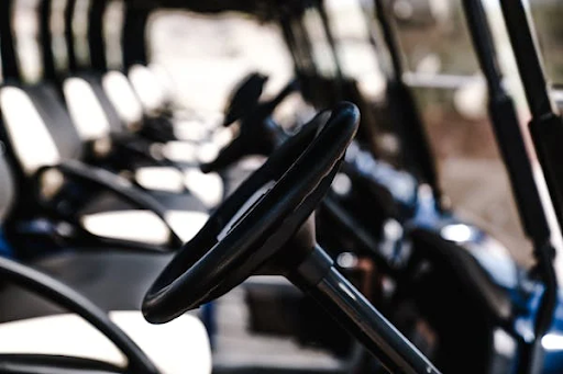 A golf cart steering wheel