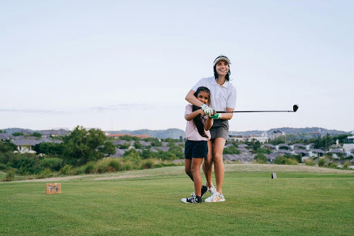 Woman and Daughter on Golf Course