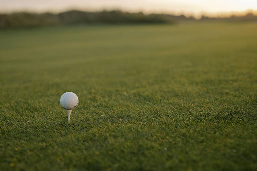 Golf ball sitting on a tee