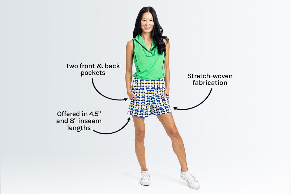 A female golfer modeling plaid KINONA shorts with text overlay benefits like tee holder.