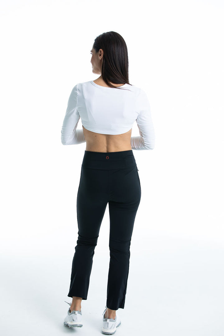 Full back view of a woman wearing a white Sun's Out Shrug With Mesh