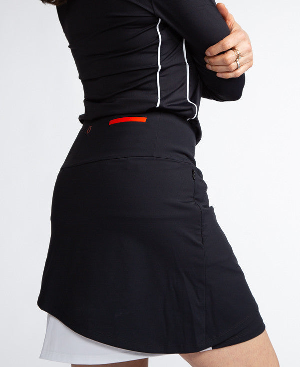 Right side view of the black/white Wrap it Up golf skort