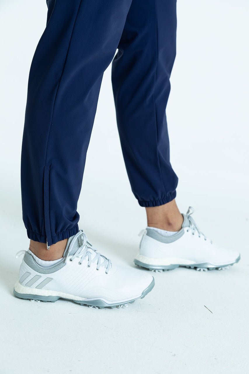 Close view of the navy blue Tailored and Trim Jogger golf pants cuffs