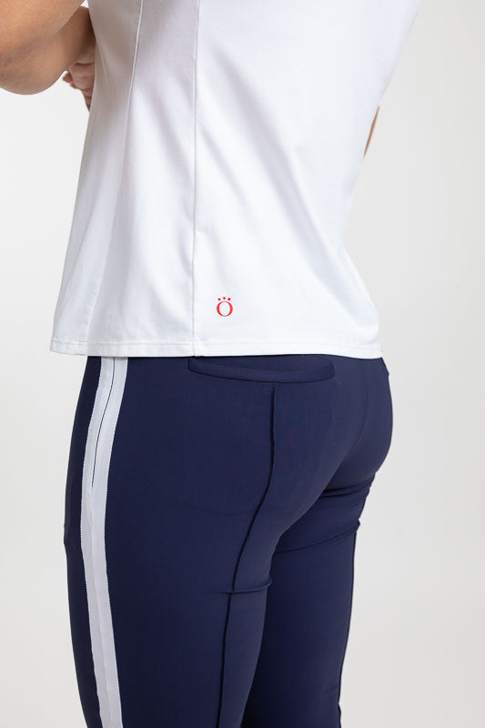 Waistline view of a Tee It Up Short Sleeve Golf Shirt in white