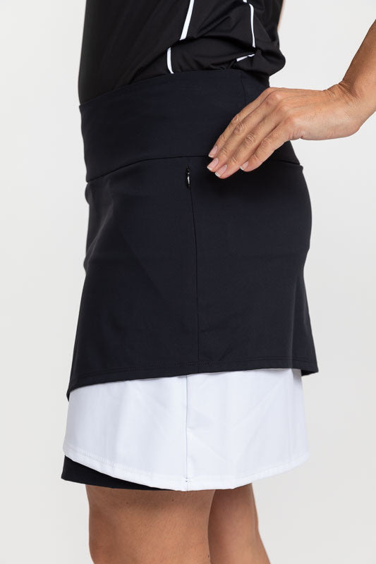 Left side view of the Wrap It Up Golf Skort in Black/White