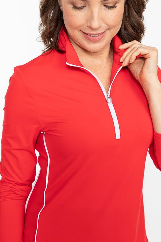 Front view of a woman wearing a Keep It Covered Long Sleeve Golf Top in Cherry Red