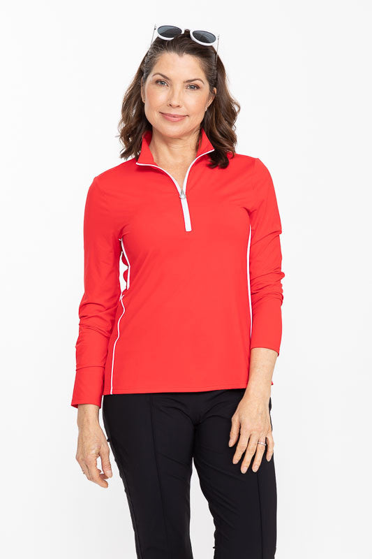 Front view of a woman wearing a Keep It Covered Long Sleeve Golf Top in Cherry Red
