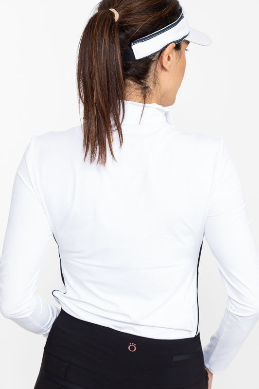 Back view of a woman wearing a Keep It Covered Long Sleeve Golf Top in white