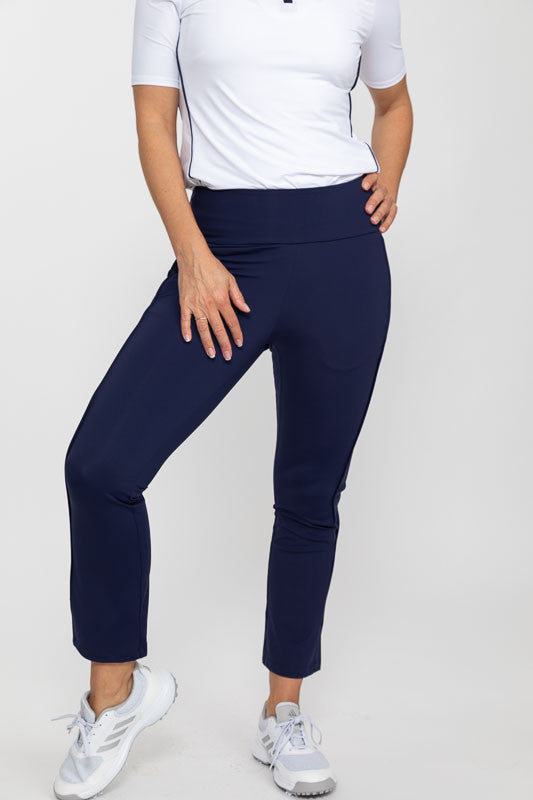 Front view of a woman wearing the Smooth Your Waist Crop Pants in navy blue