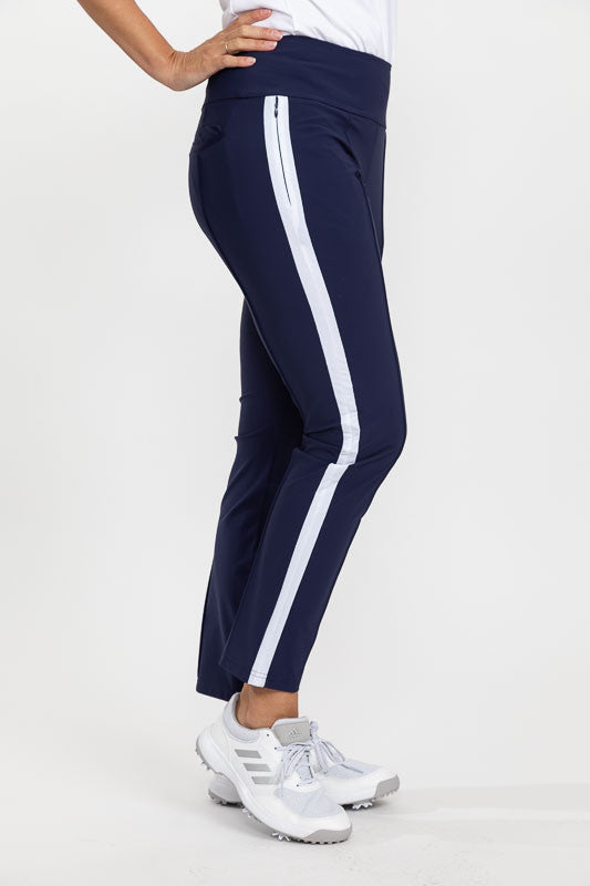 Right side view of the Tailored Track Golf Pants in navy blue with a white stripe down the side of the leg