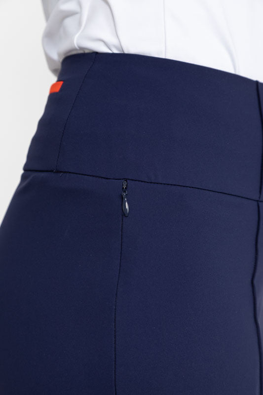 Close right side view of the waistline and pocket on the Tailored and Trim Golf Shorts in navy blue.