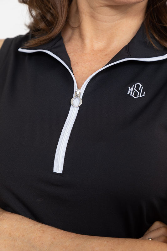 Close view of the zipper and neckline on the Keep It Covered Sleeveless Golf Top in black