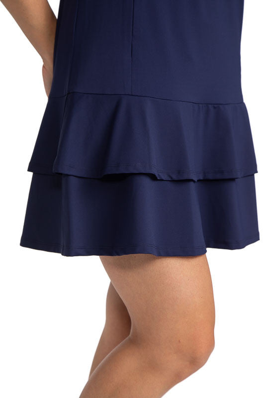 View of the hemline on the On In Two Sleeveless Golf Dress in Navy Blue