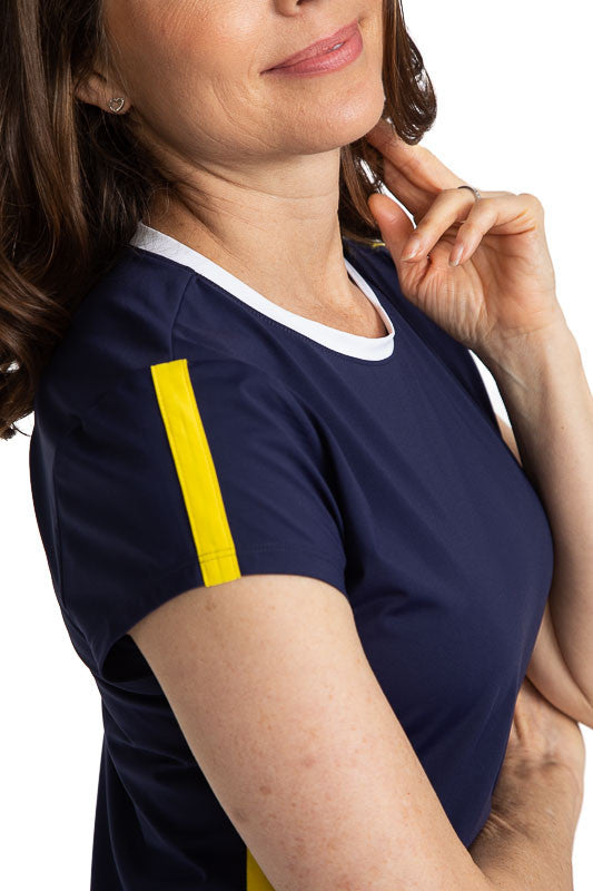 Close view of the neckline and right shoulder on the Pin High Short Sleeve Golf Dress in navy blue