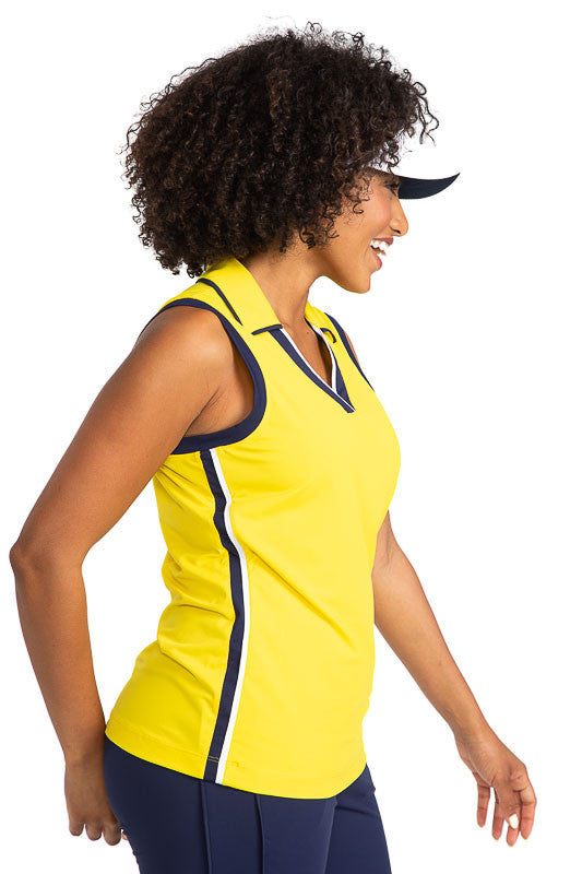 Side view of the  On Par Sleeveless Golf Top in Lemon Yellow. This shirt has navy blue and white accents at the V on the front of the shirt, and down each side, , along with navy blue accents around each armhole.  This view provides a view of the navy blu