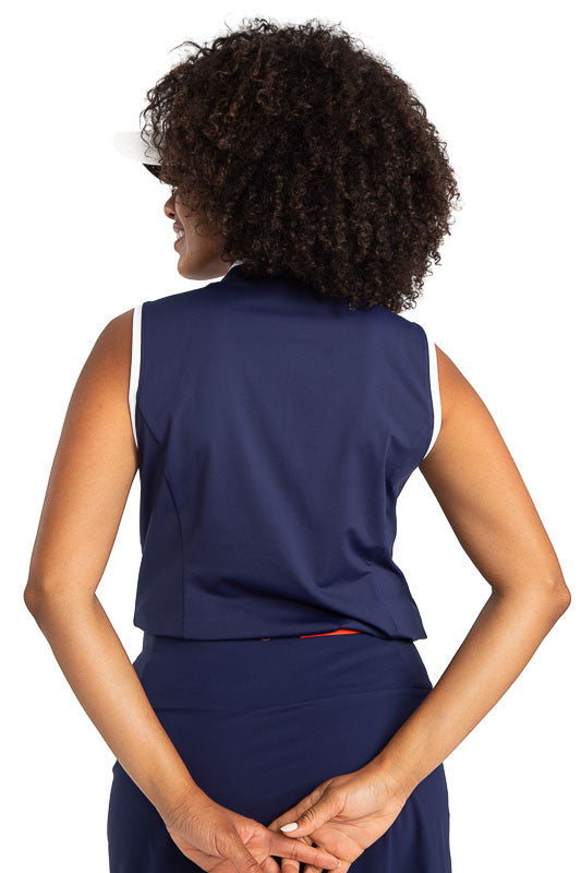 Back view of the Looking Snappy Sleeveless Golf Top in Navy Blue. This top also has white accents around the collar and down the front of the top and around each armhole.
