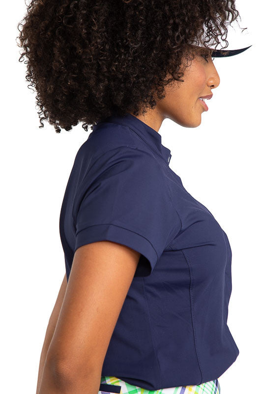 Close side view of the Band Collar Beauty Short Sleeve Golf Top in Navy Blue