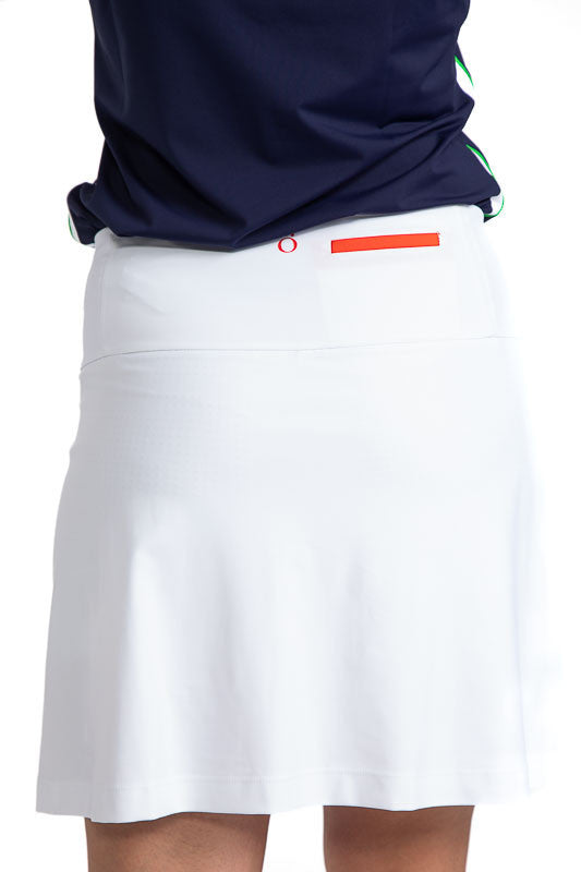 Back view of the Show Me The Way Golf Skort in White. This skort has accents in the form of two diagonal line on both sides of the front of the skort in Fairway Green and Navy Blue. There are also Navy Blue accents on each pocket on this skort.