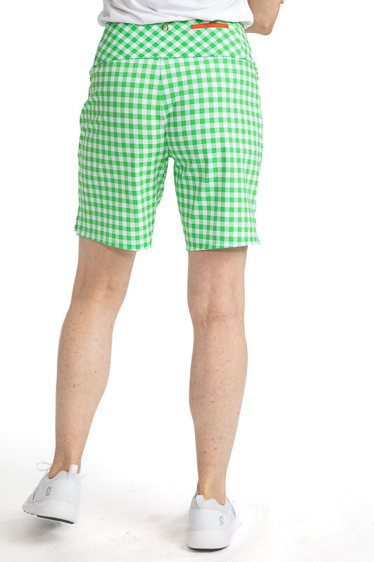 Back view of the Tailored and Trim Golf Shorts in Go Go Gingham. The Go Go Gingham print is a green and white checkered print.
