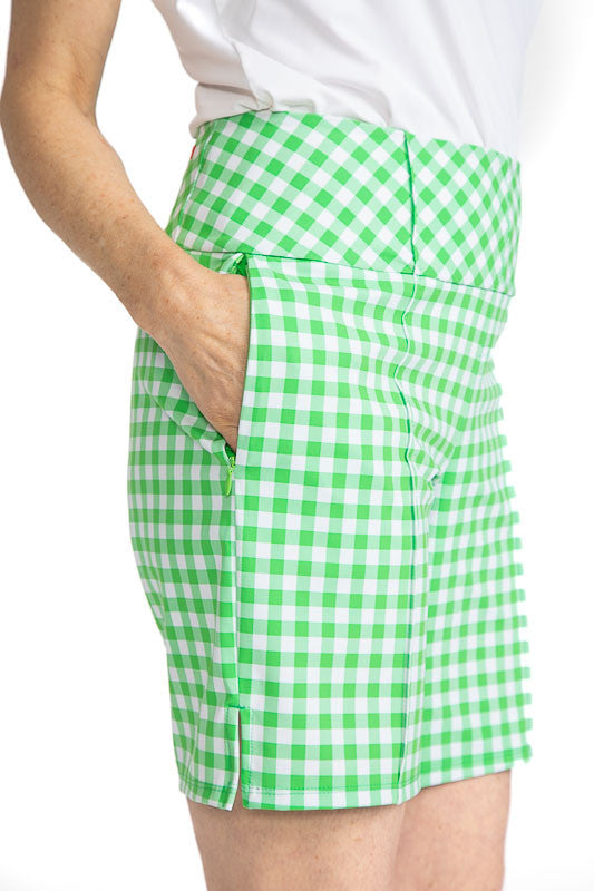 Close right side view of the pocket on the Tailored and Trim Golf Shorts in Go Go Gingham. The Go Go Gingham print is a green and white checkered print.