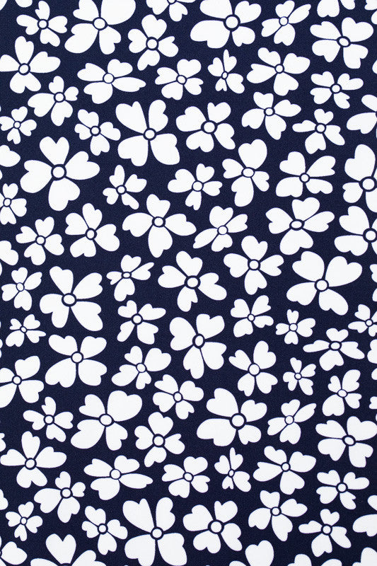 Color swatch - Vinca Print. This is a navy blue background with small, white flowers.