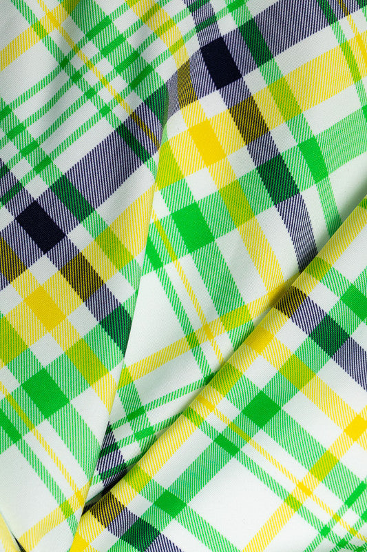 Color swatch - Picnic Plaid. This print is made up of navy blue, white, fairway green, and lemon yellow.
