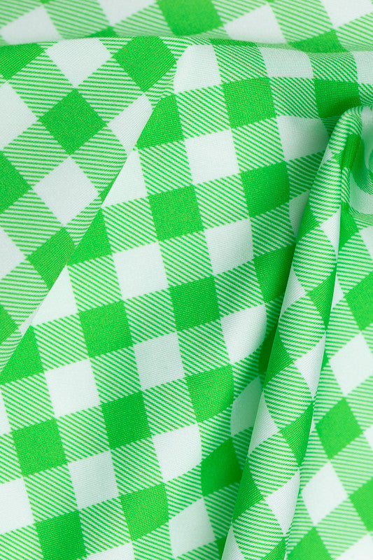 Color swatch - Go Go Gingham. This print is made up of fairway green and white checks.