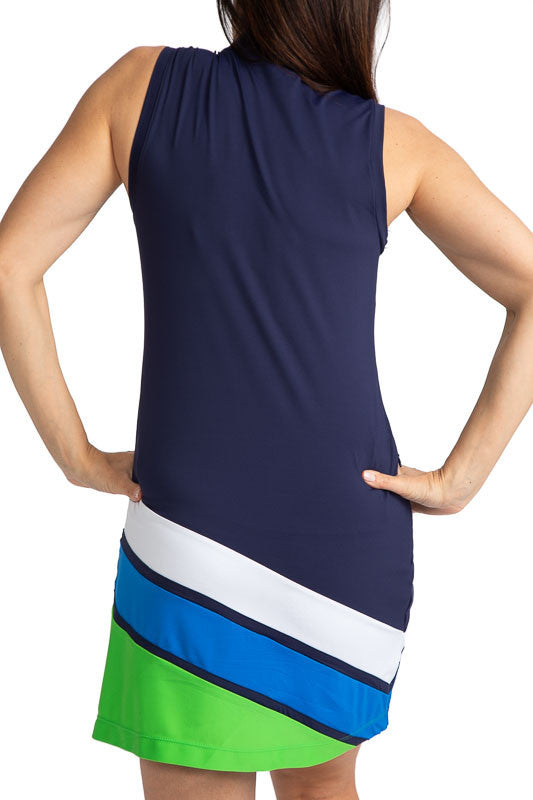 Back view of the Tee to Green Sleeveless Golf Dress in Navy Blue. This dress has diagonal stripes at the bottom in white, azure blue, and fairway green. 