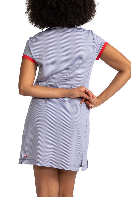 Complete back view of the Approach Shot Short Sleeve Golf Dress in Workin' it Stripe. This stripe pattern consists of navy blue stripes on a white background. There are also cherry red accents around each sleeve and around the neckline with navy blue acce