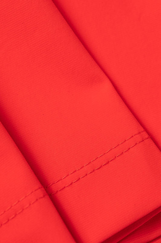 Color swatch - Cherry Red. This is the accent color around each sleeve and the neckline on the Approach Shot Short Sleeve Golf Dress in Workin' It Stripe.