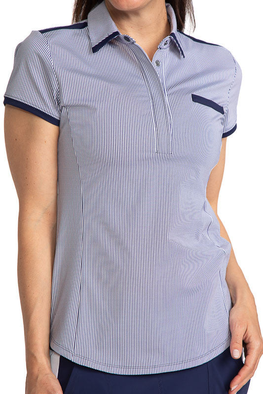 Complete front view of the Cute and Classic Short Sleeve Golf Top in Workin' It Stripe. This stripe pattern consists of navy blue stripes on a white background. This top also has navy blue accents around each sleeve, across the top of the front pocket, di