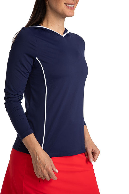 Close front view of the Layer It Up Long Sleeve Hoodie Golf Top in Navy Blue. There are white accents around the edge of the hood and down each side of this hoodie.