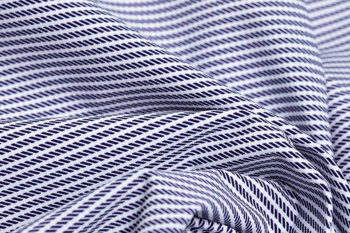 Color swatch - Workin' It Stripe. This stripe pattern consists of navy blue stripes on a white background. 