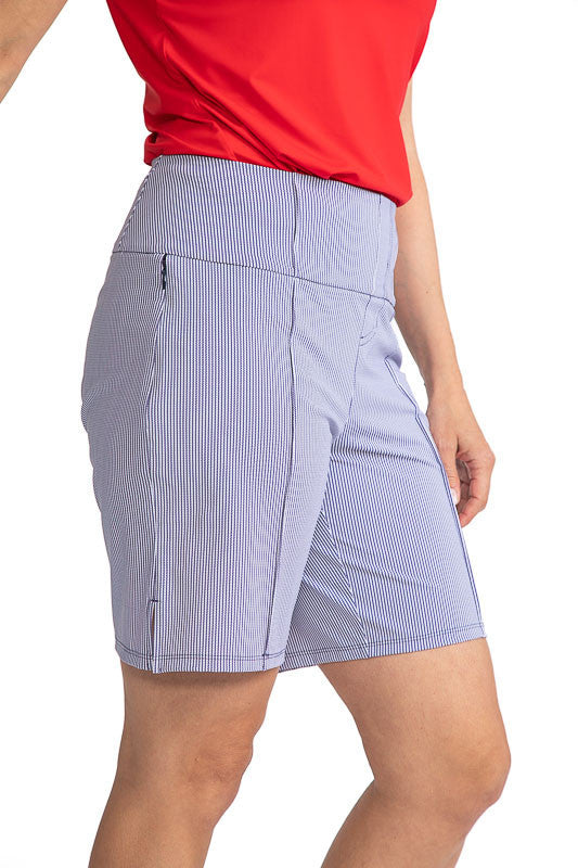 Right side view of the Tailored and Trim Golf Shorts in Workin' It Stripe. This stripe pattern consists of navy blue stripes on a white background.