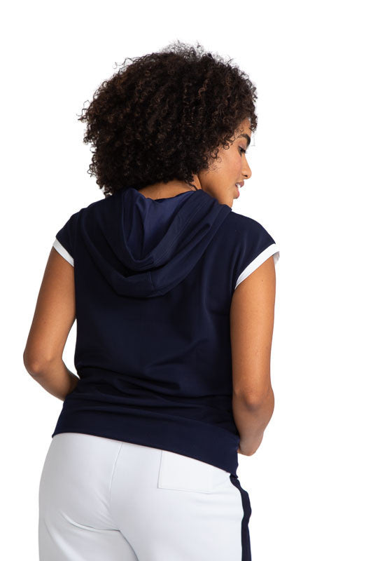 Back view of a woman wearing the Apres 18 Extended Shoulder Hoodie in Navy Blue.