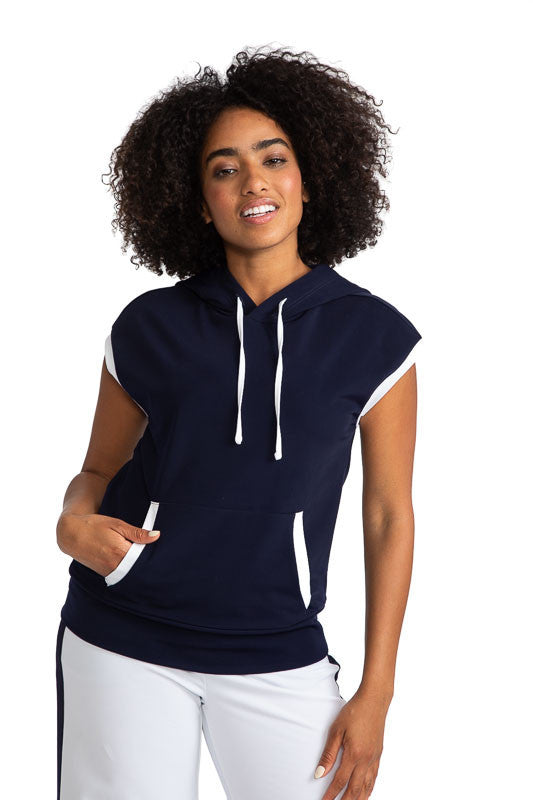 Front view of a smiling woman wearing the Apres 18 Extended Shoulder Hoodie in Navy Blue.