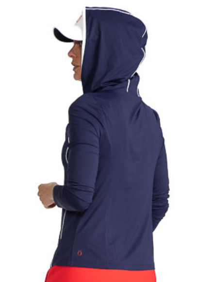 Back view of a woman wearing the Layer It Up Long Sleeve Hoodie Golf Top in Navy Blue with the hood pulled up over her No Hat Hair Visor. There are white accents around the edge of the hood and down each side of this hoodie.