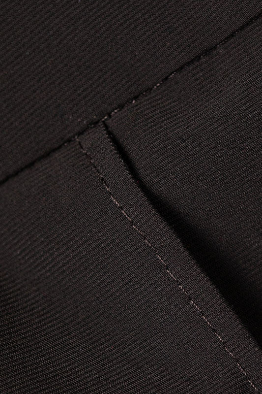 Color swatch - black. This is the main color on the Apres 18 Sport Skirt in Black. This skirt has a white strip running down each side.