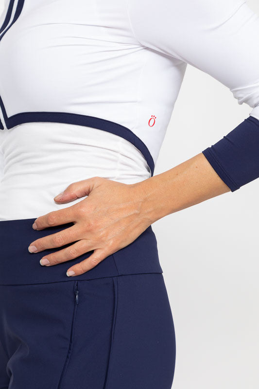 Close left front and side view of the Sun's Out Zip Front Shrug in White/Navy Blue