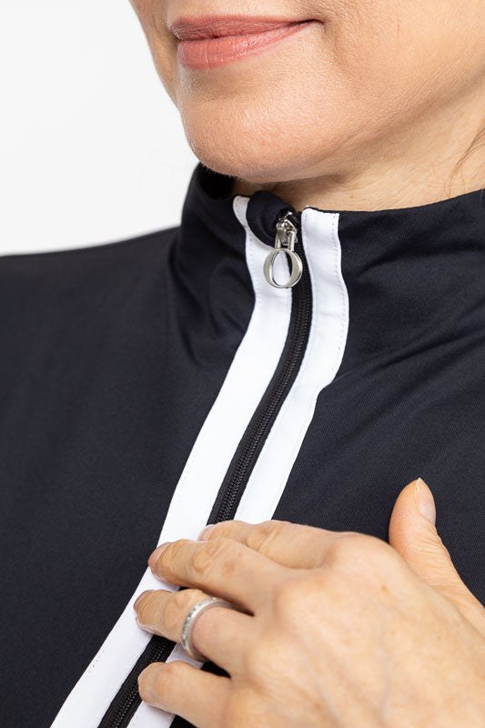 Close up of the zipper on the Sun's Out Zip Front Shrug in Black