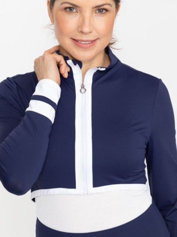 Front view of a smiling woman wearing a zipped up Sun's Out Zip Front Shrug in Navy Blue