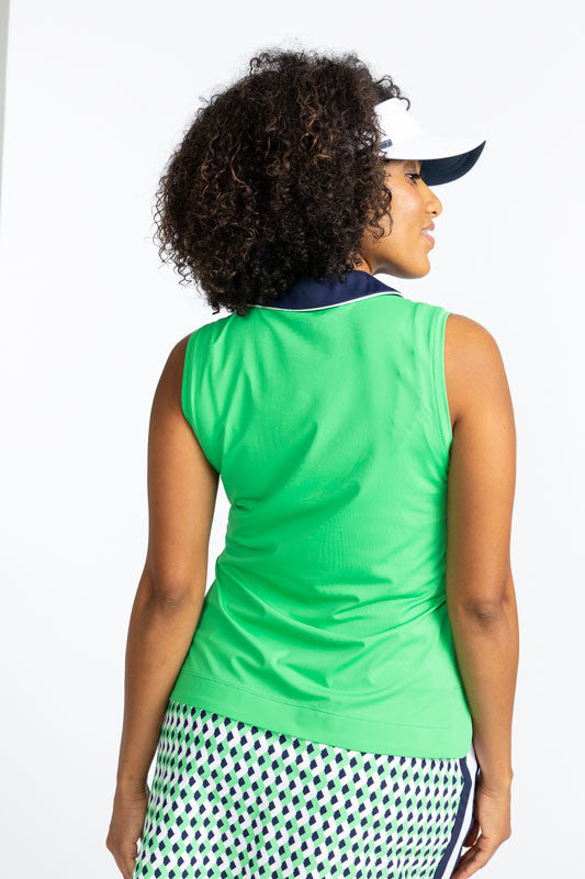 Back view of the Victory Sleeveless Golf Top in Kelly Green and the No Hat Hair Visor in White. This top has a navy blue collar and v-neck.