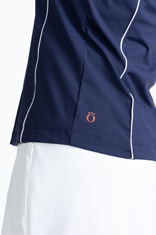 Close left side view of the hemline on the Dew Sweeper Sleeveless Golf Top in Navy Blue
