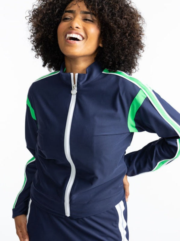 Front view of the Warm Up Jacket in Navy Blue. This jacket is primarily navy blue with a white zipper that runs down the front of this jacket. There is also a Kelly Green stripe that runs around each armhole and a solid Kelly Green stripe with a solid, th