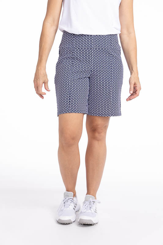 Front view of the Golf Glove Friendly Golf Shorts in Chic Chevron print. This print consists of white chevrons on a navy blue background.