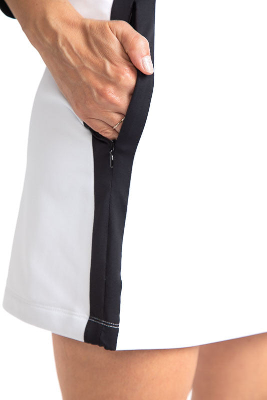 Tight right side view of the Apres 18 Sport Skirt in White. This skirt has a black stripe down each side.