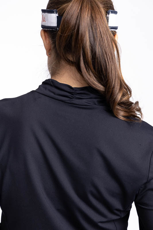 Close back view of the Lovely Layer Long Sleeve Golf Top in Black.