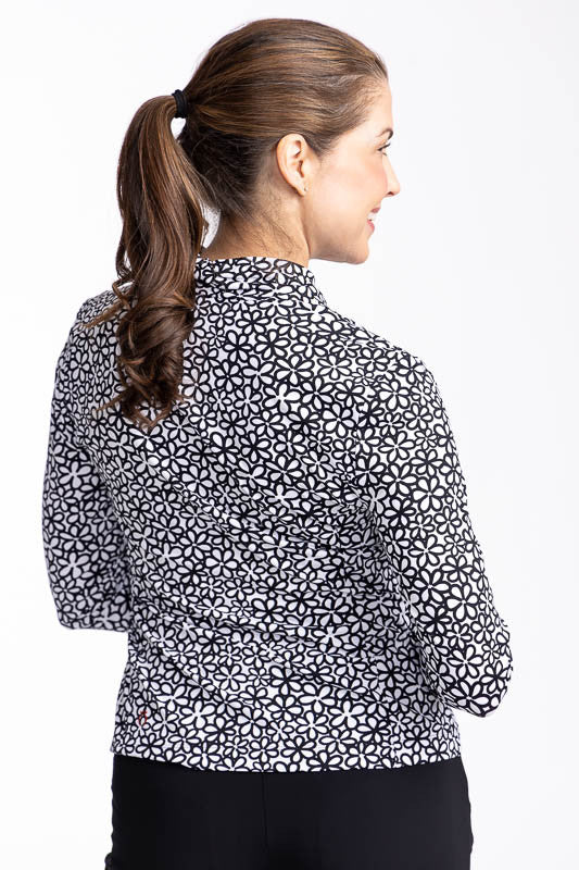 Back view of the Lovely Layer Long Sleeve Golf Top in Fall Bloom print.